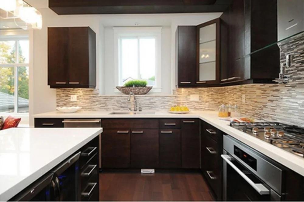 A remodeled kitchen with custom cabinetry.
